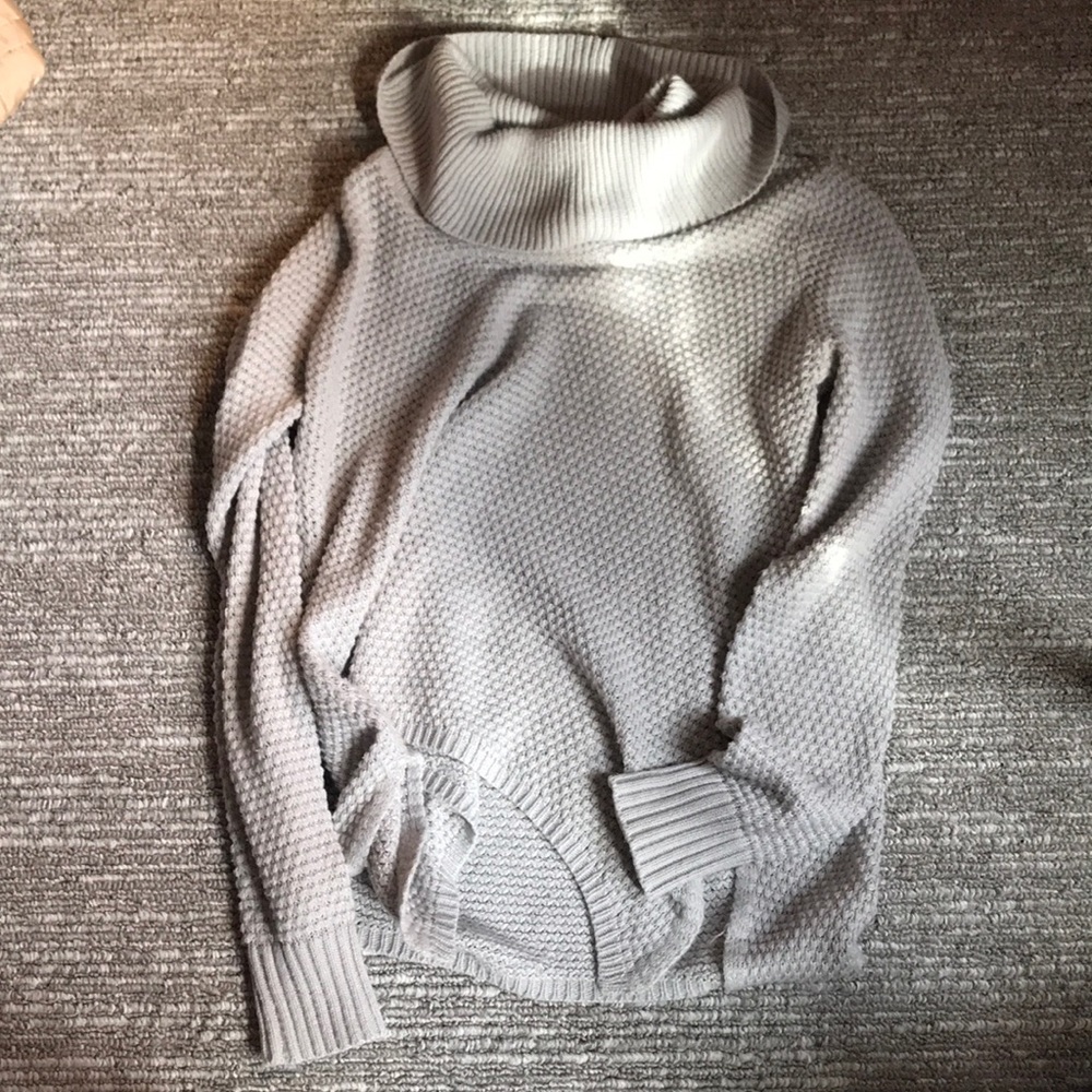 Long sleeve sweater with a wide hang over neck